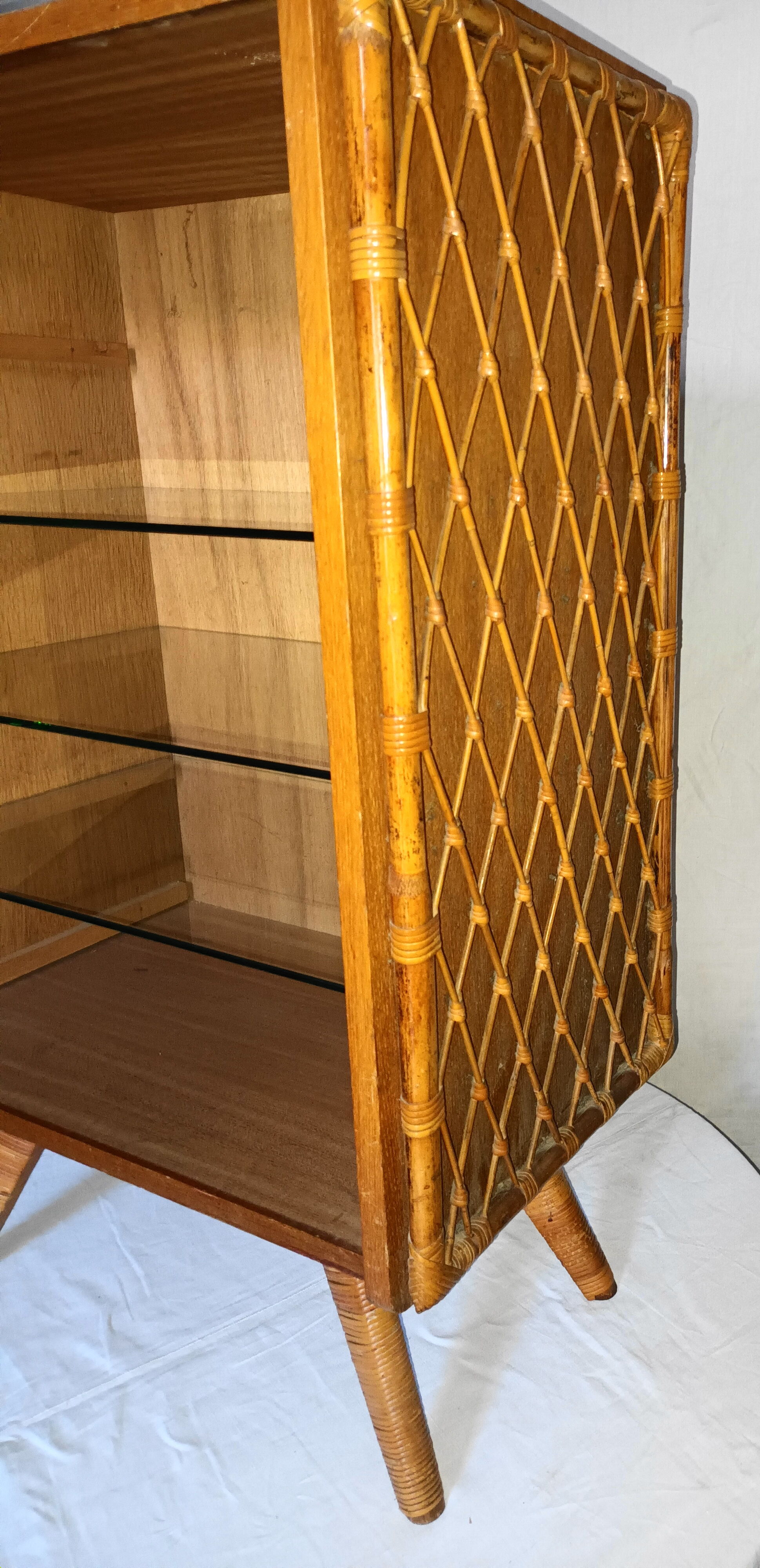 Bibus has 3 wooden and bamboo shelves from the 50s