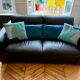 Natuzzi black leather sofa – 2-seater contemporary design