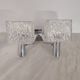 Vintage wall light in textured moulded glass and chrome metal.