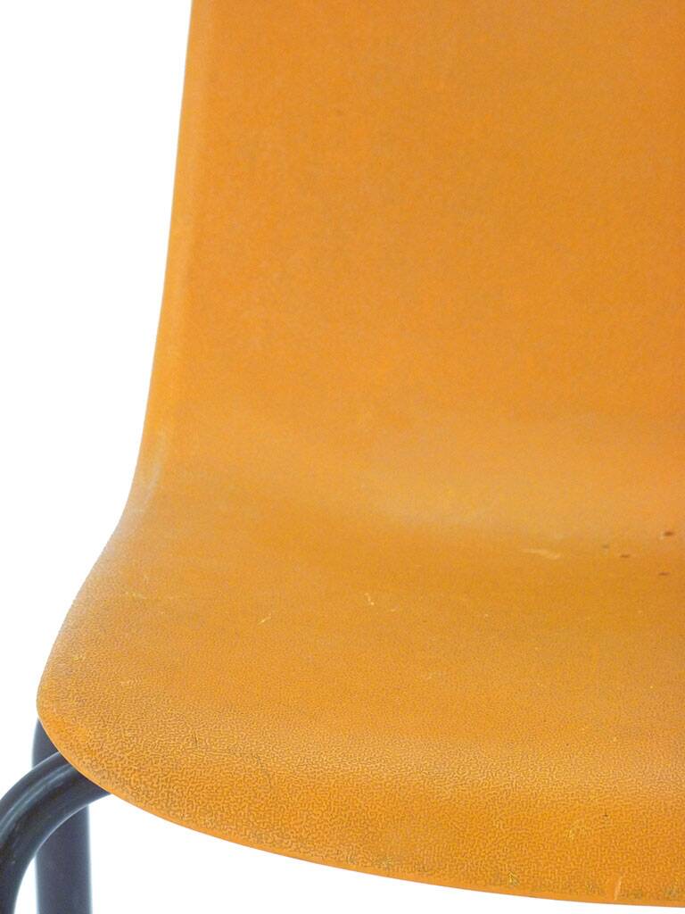 Orange plastic school chair
