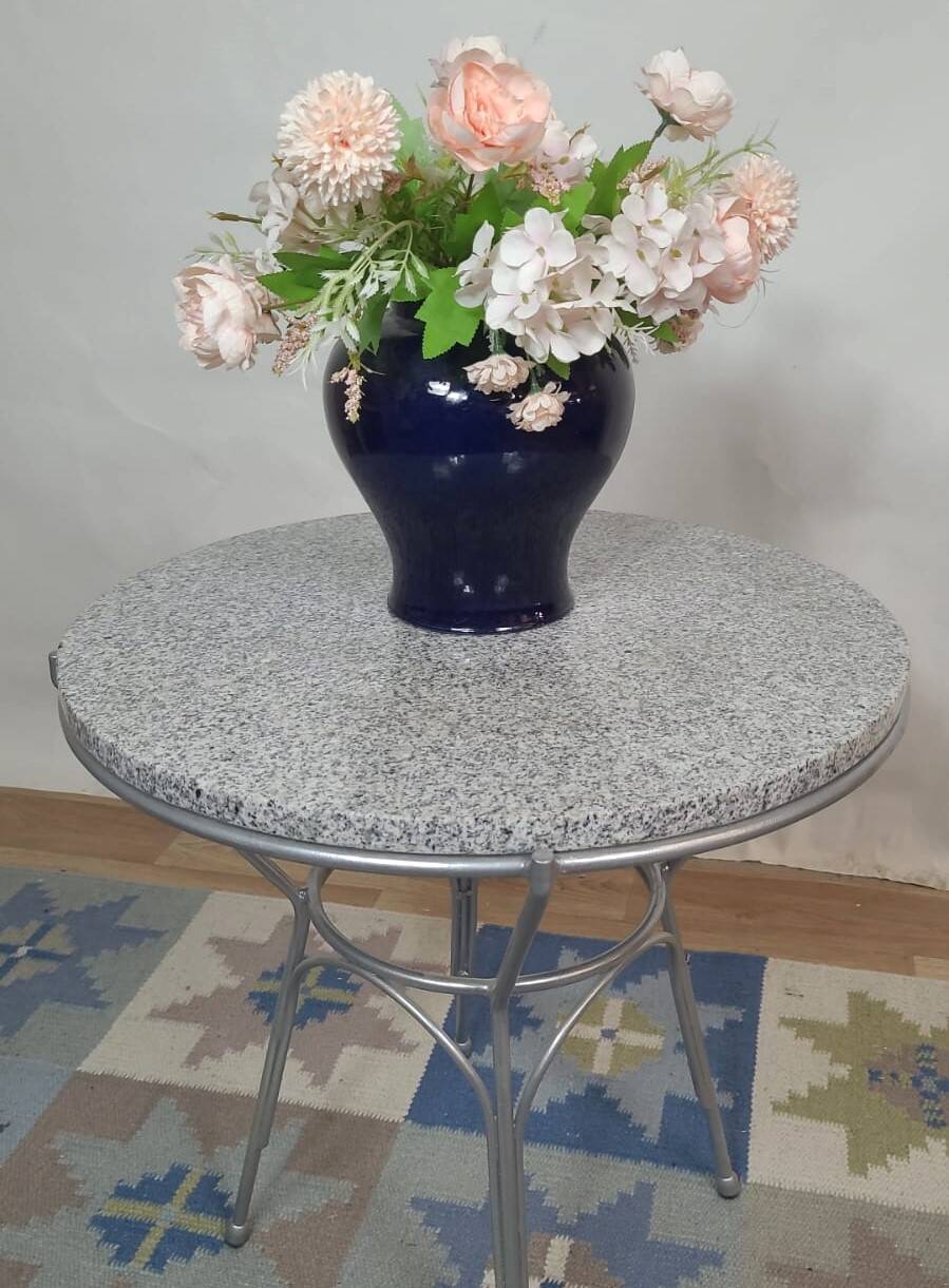 Round coffee table in grey granite and silver metal, German design 1960.
