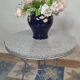 Round coffee table in grey granite and silver metal, German design 1960.