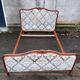 Louis XV style upholstered bed
