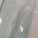 Vintage vase in very pale green bubbled glass, handcrafted