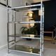 Chrome and smoked glass bookcase/shelf, circa 1970