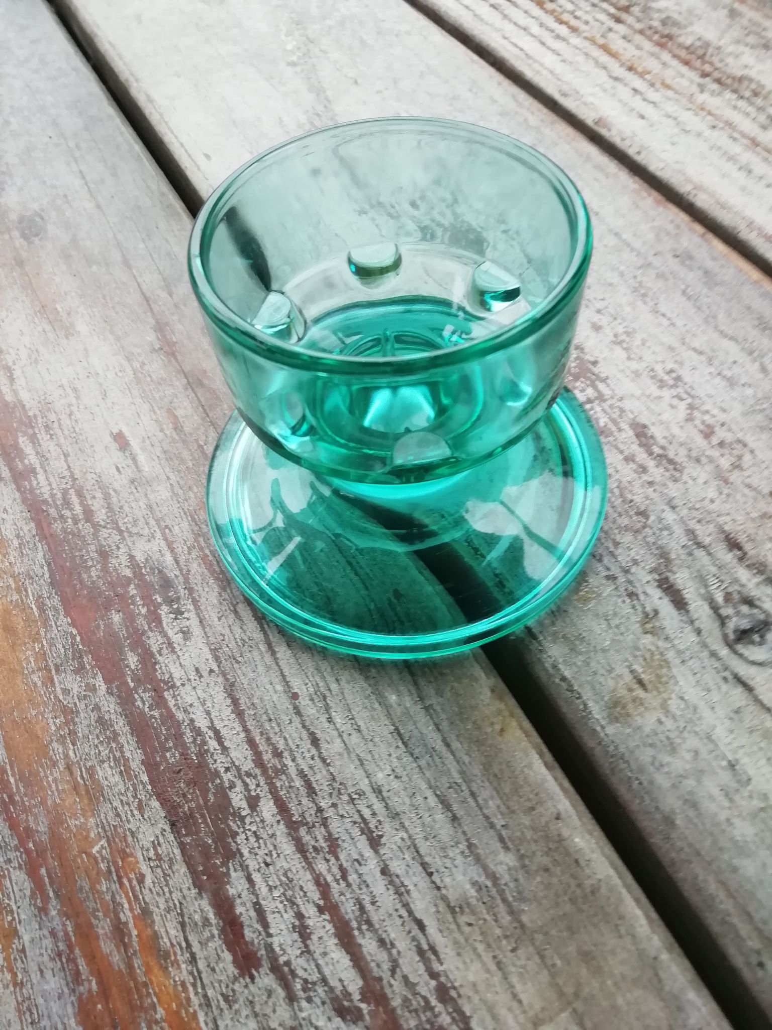Green glass candlestick