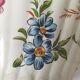 Antique vase with floral decoration in enamelled earthenware – timeless charm