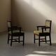 Pair of modernist armchairs in solid oak, France, circa 1940.