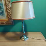 Silver metal lamp with its lampshade