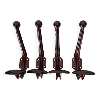 Vintage coat hooks in burgundy lacquered metal