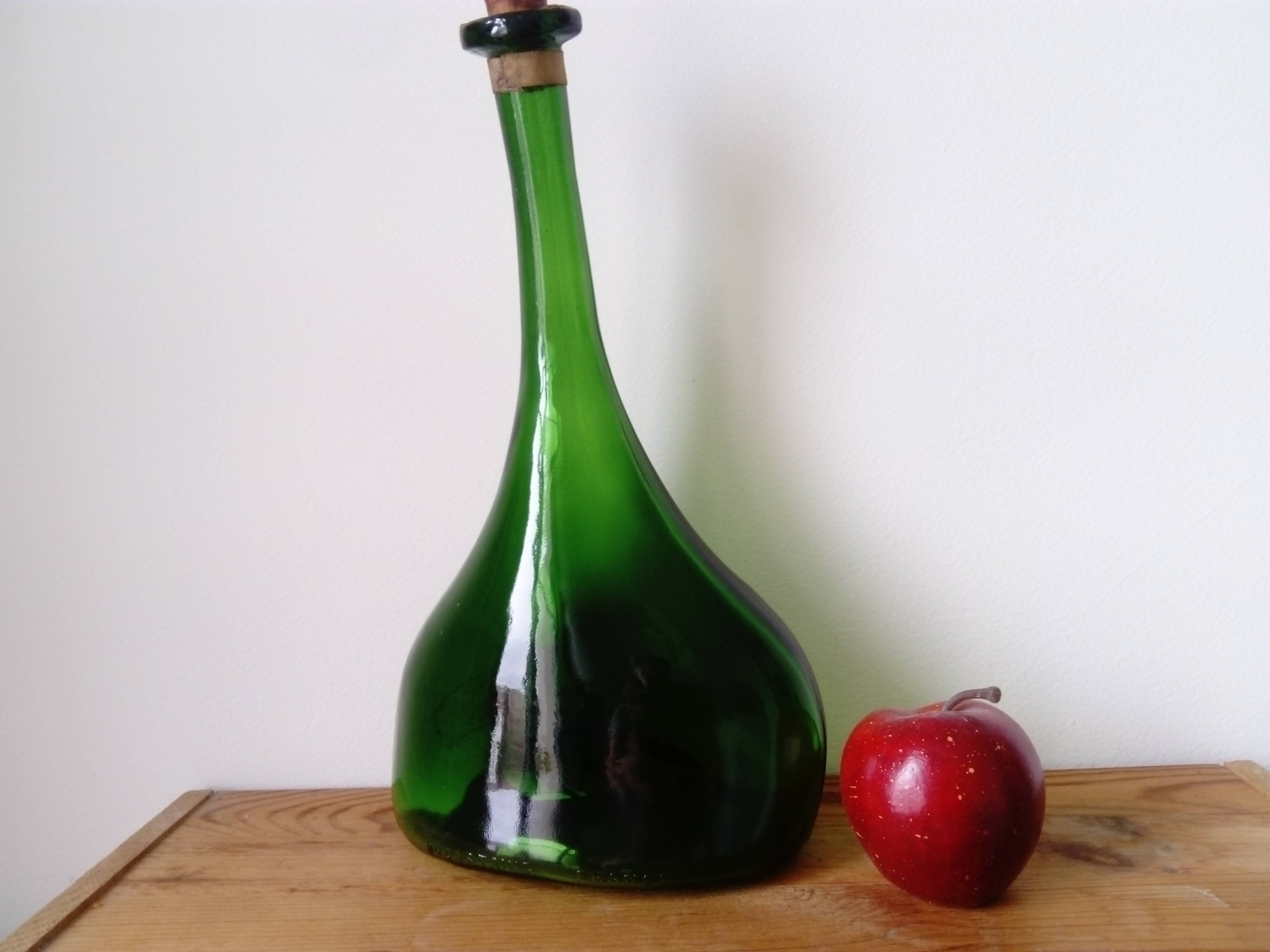 Old blown glass bottle, free form. Armagnac