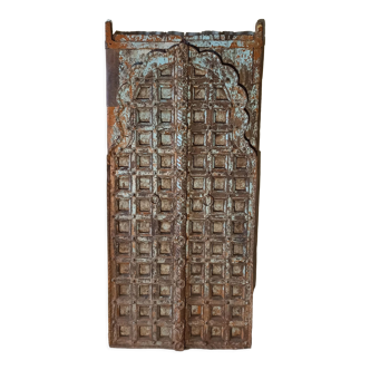 Old wooden door with braces