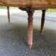 Round extendable banquet table stripped in solid mahogany with 4 extensions, 19th century.