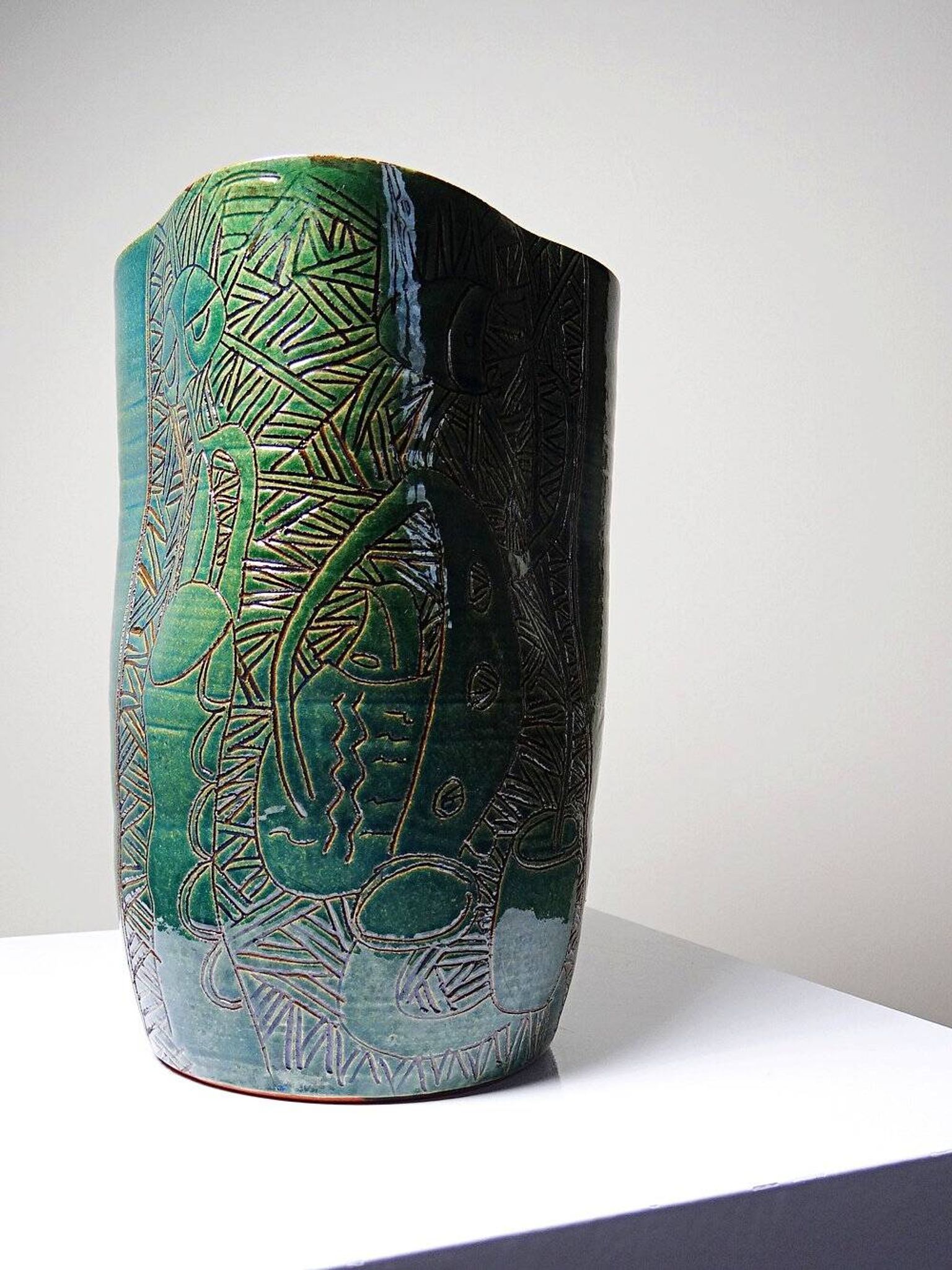 Vintage blue-green handcrafted pottery vase with incised tribal design by Eseka Pottery