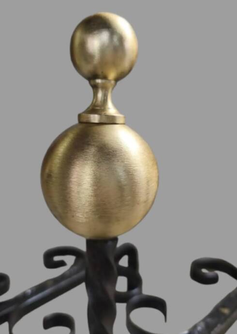 Pair of wrought iron candlesticks with cast bronze ball, 1970s.