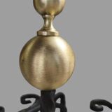 Pair of wrought iron candlesticks with cast bronze ball, 1970s.