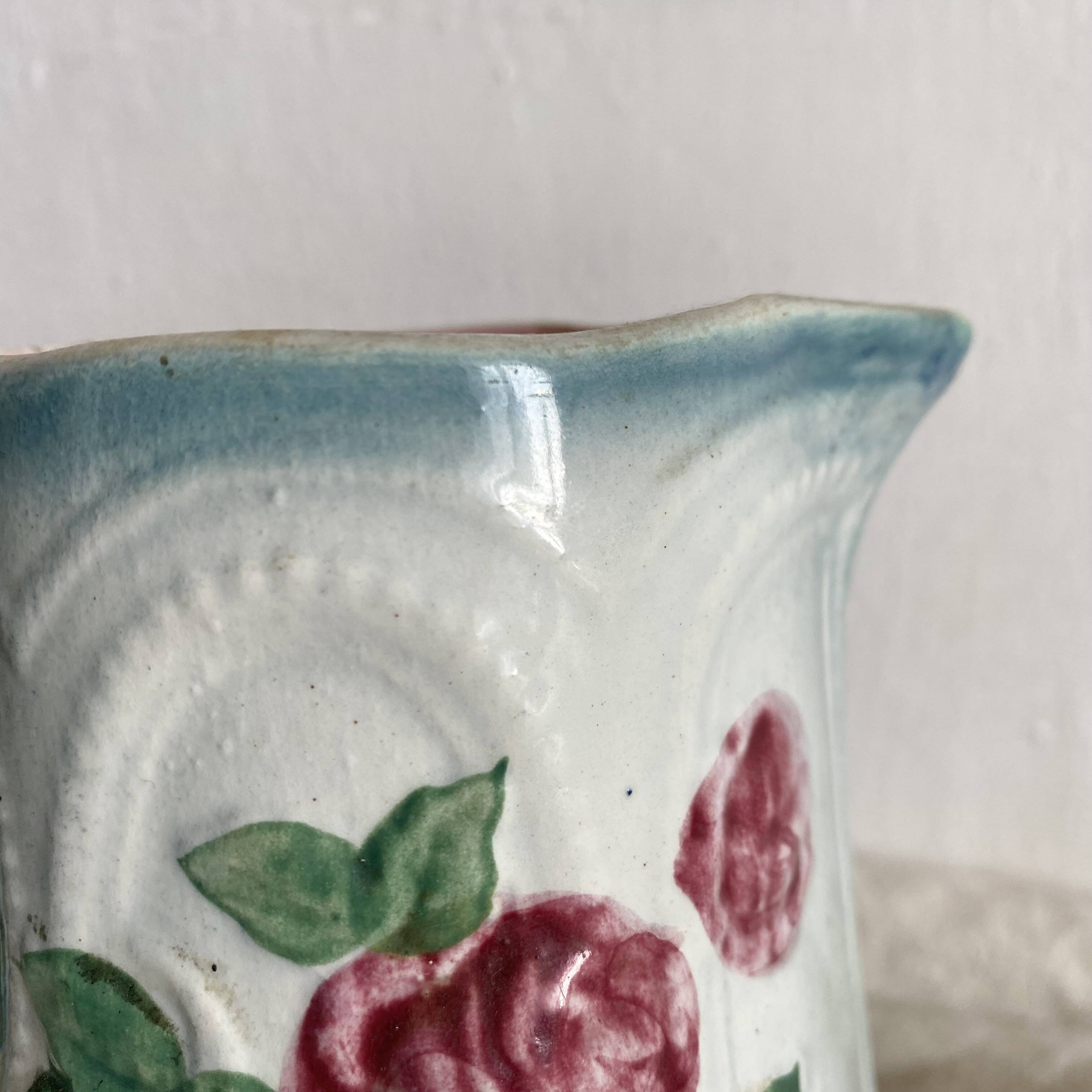 Art Nouveau slip pitcher with roses