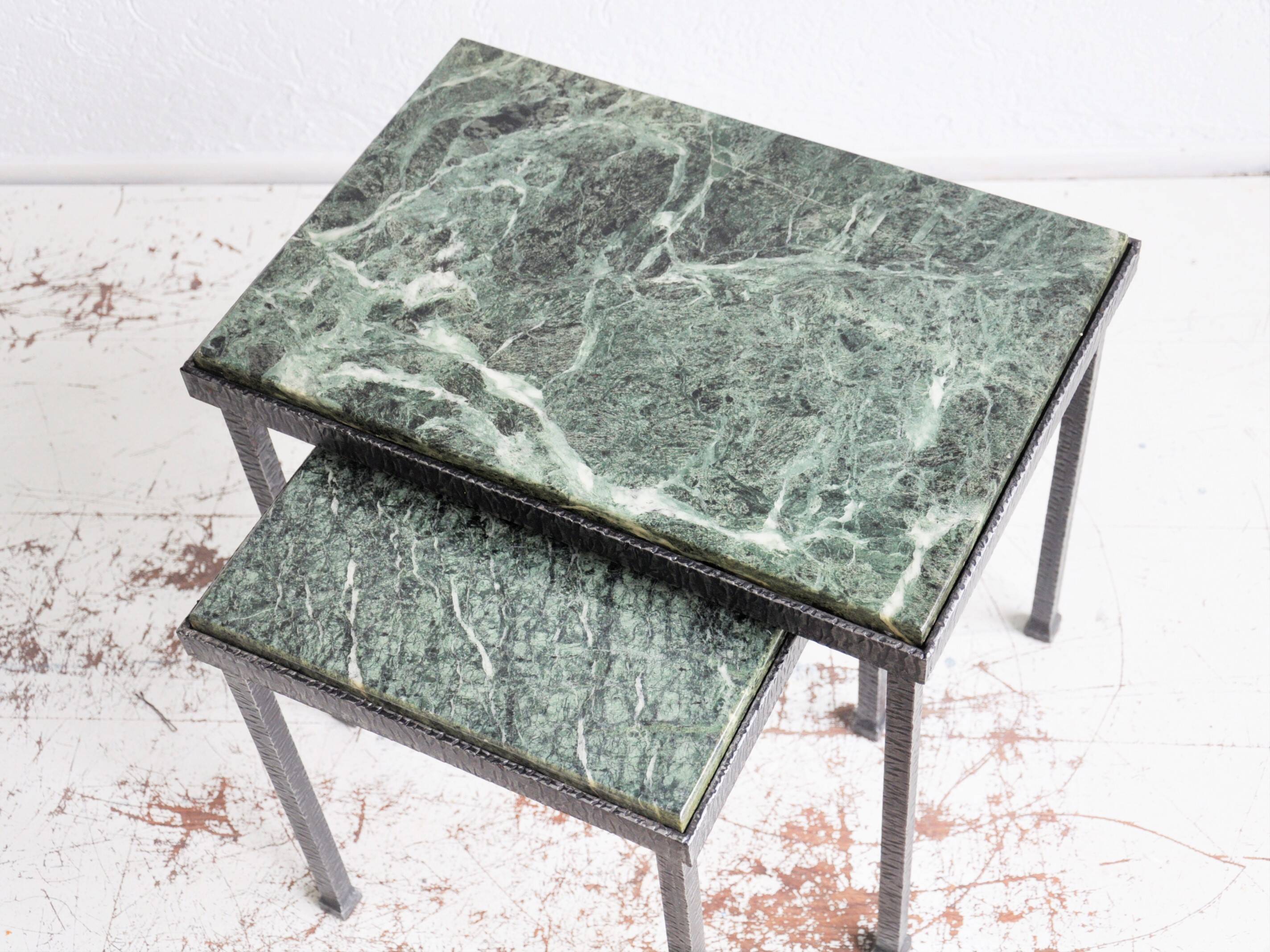 Green nesting coffee table with marble top and iron frame