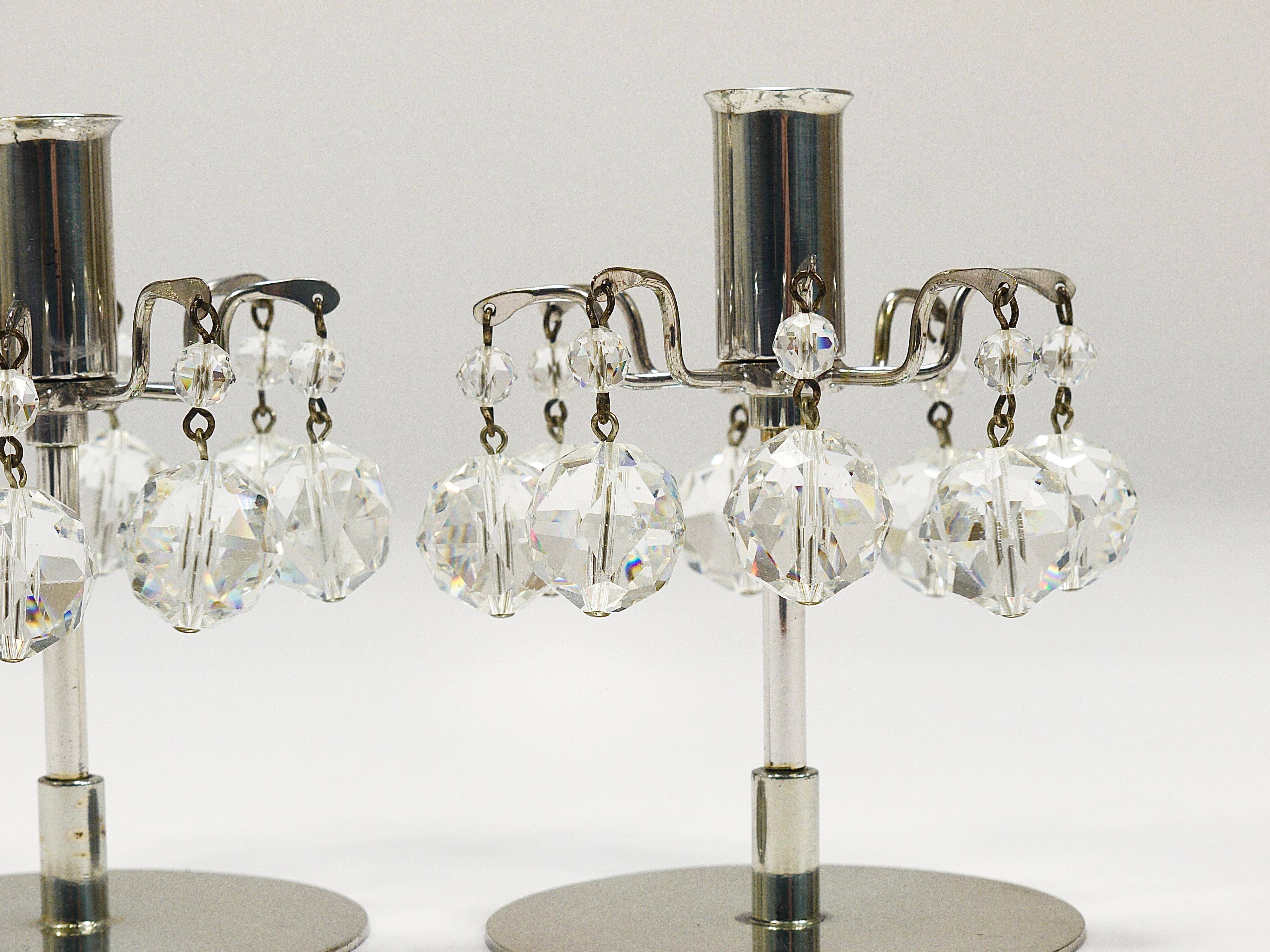 Pair of candlesticks "Lights of Vienna" J.L. Lobmeyr, faceted Swarovski crystals