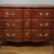 Commode arbalète trois tiroirs en merisier