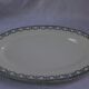 Oval plate in earthenware decoration garland Louis XVI green