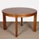 Round extendable dining table in wood published by Monopoly, 1970.