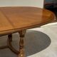 Oak dining table, oval living room table with two extensions.