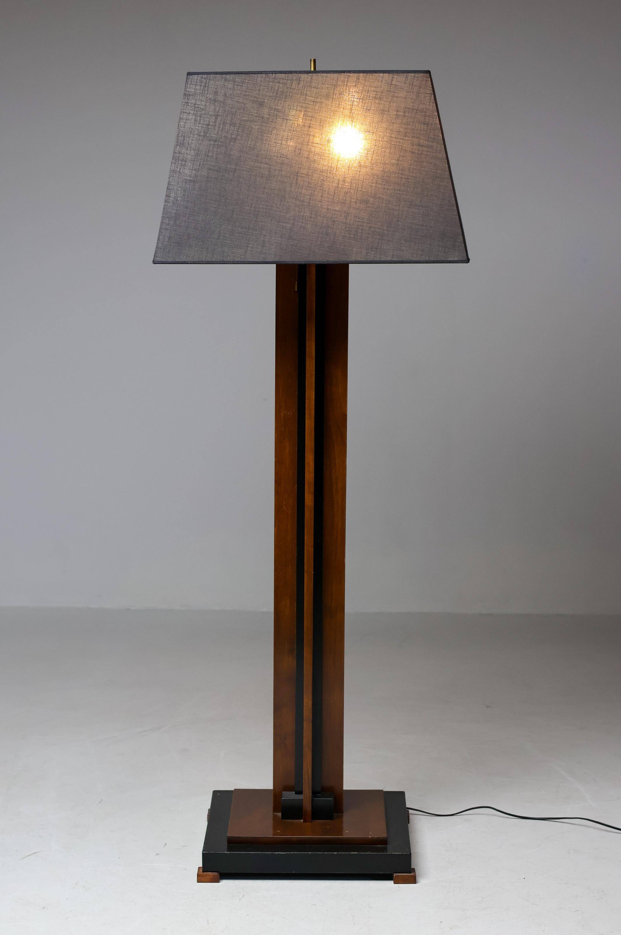 Amsterdam School floor lamp in partially ebonised cherry with a black linen shade.