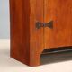 Vintage walnut wardrobe with exposed hardware.