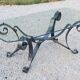 Coffee table from the 70s in wrought iron glass top bec de corbin