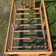 Table basse vintage en rotin et verre
