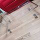 Design coffee table from Habitat in transparent plexiglass, mounted on wheels.