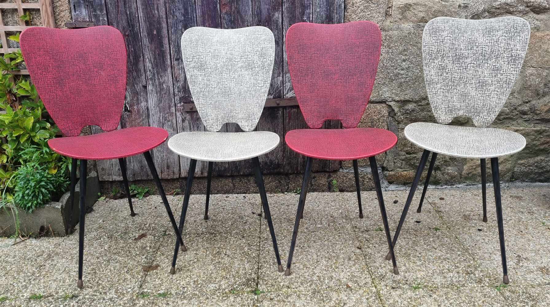 Four modernist chairs, steel, brass and skaï, 60s