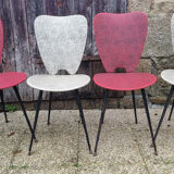 Four modernist chairs, steel, brass and skaï, 60s