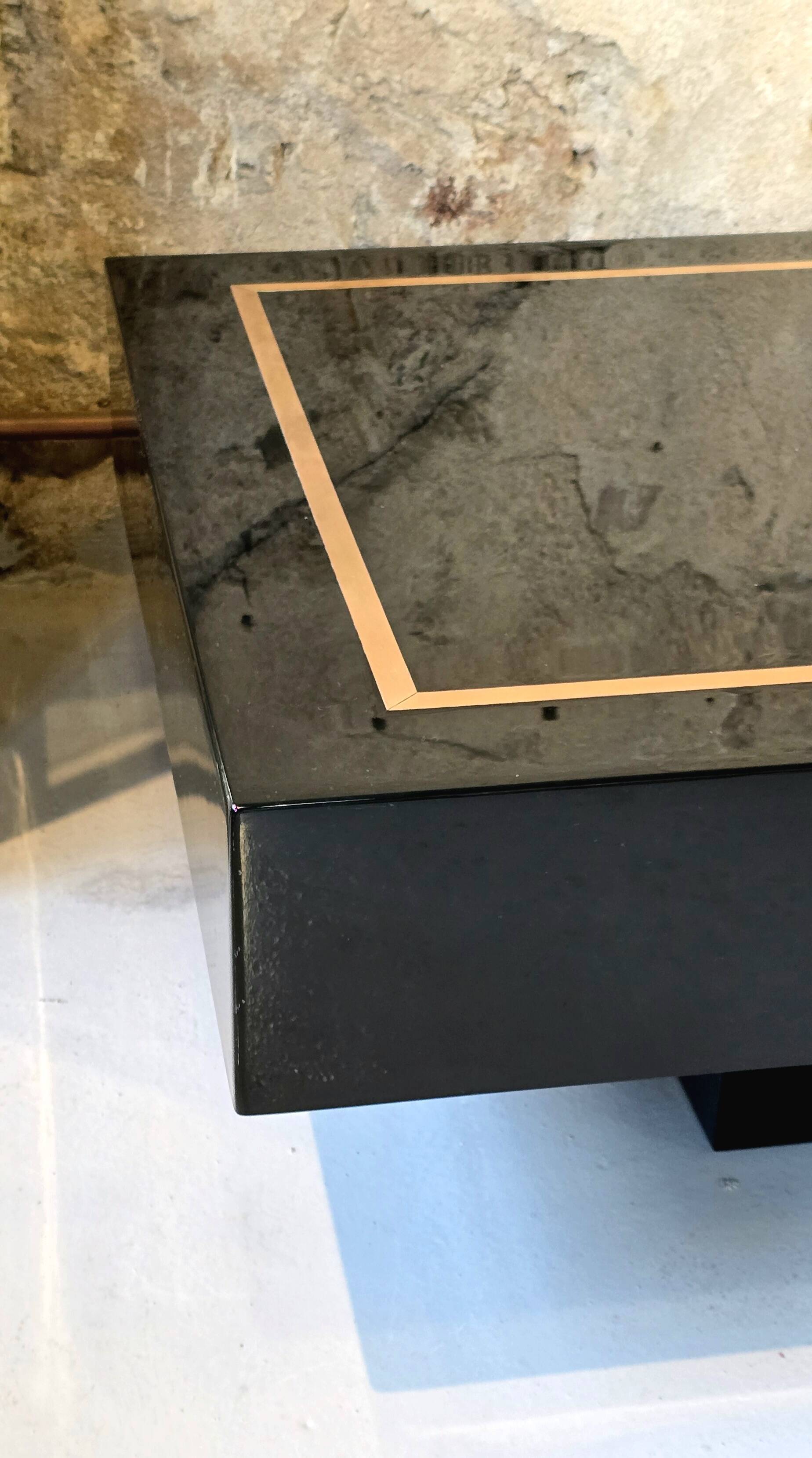 Jean-Claude Mahey, attributed to – Black lacquer and brass coffee table, Mais