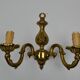 Pair of wall lamps with two lights in Louis XV style bronze