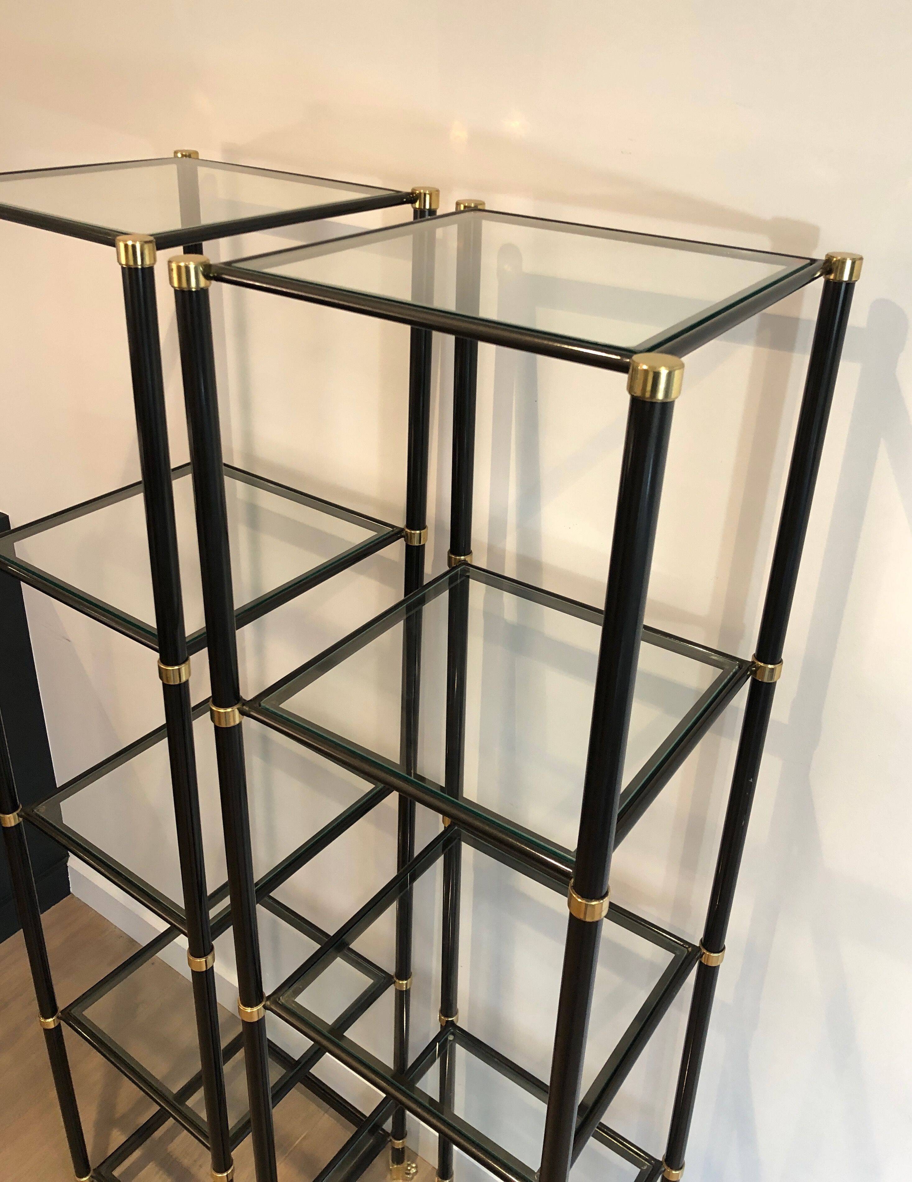Pair of black lacquered metal and brass shelves. Guy Lefèvre for Maison Jansen. Circa 1970.