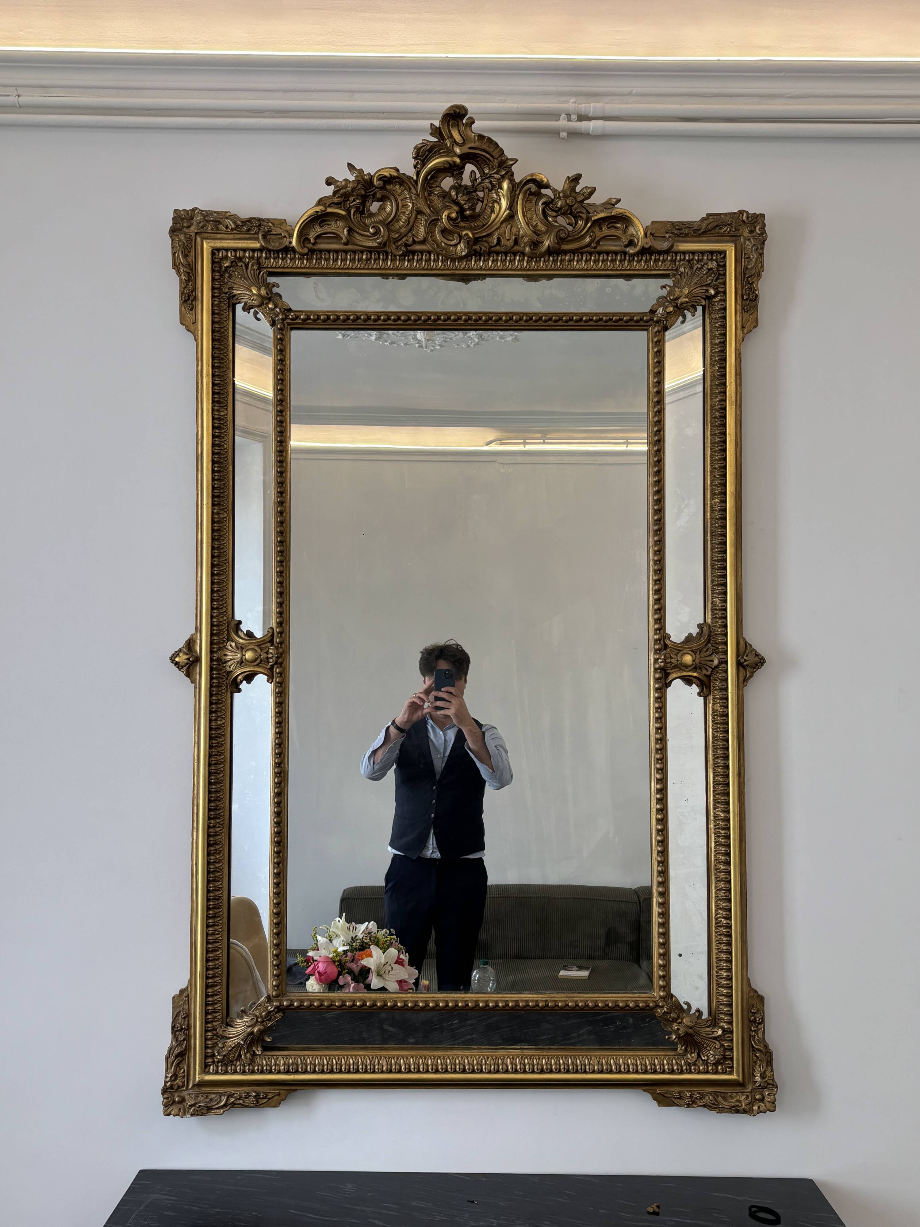 Louis XV style mirror with moulded gilded wood and stucco from the Napoleonic III era.