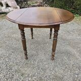 Extendable/foldable round table in walnut