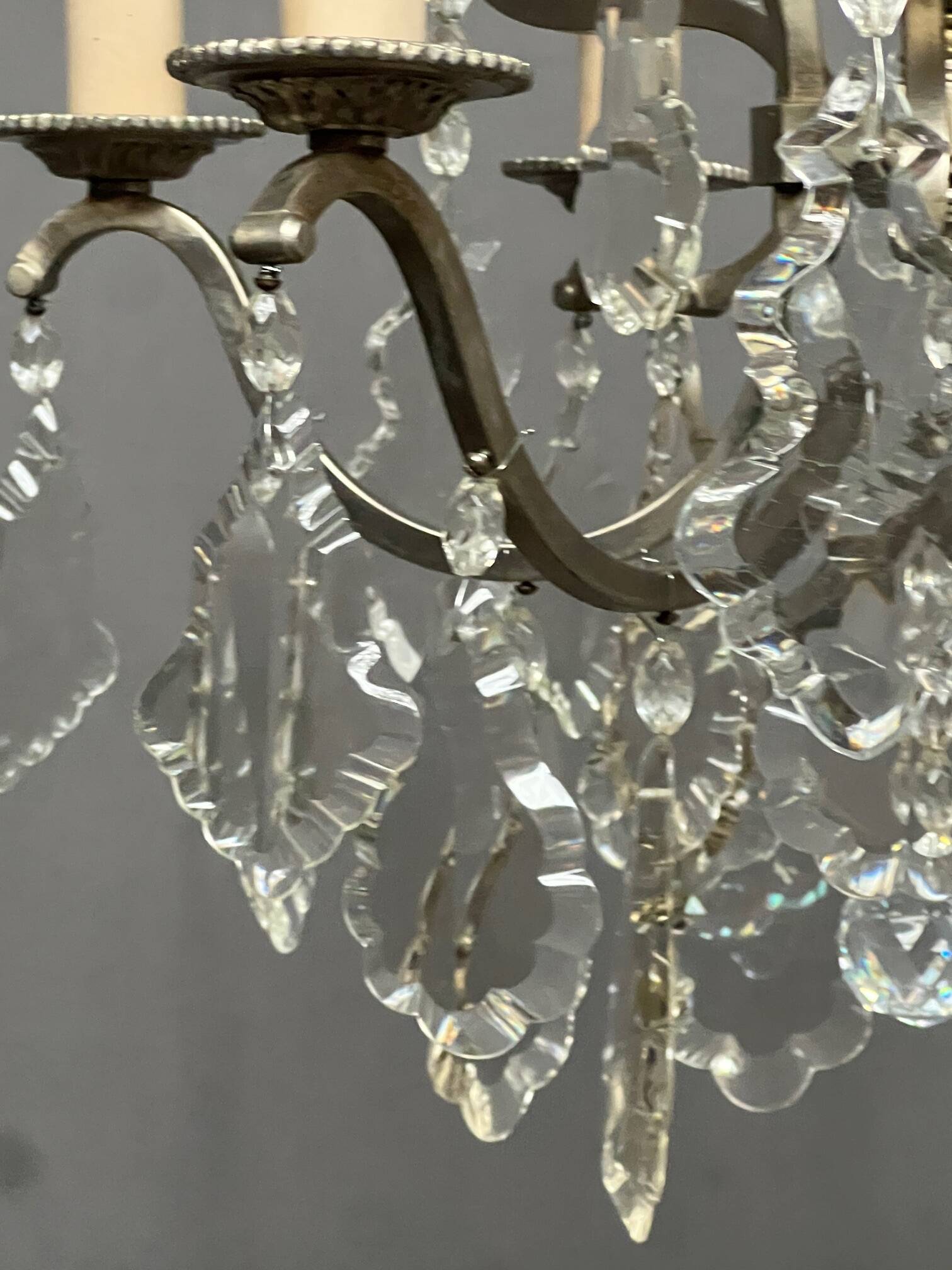 Rococo-style chandelier with 9 light arms.