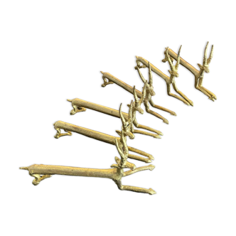 6 brass antelope-shaped knife holders
