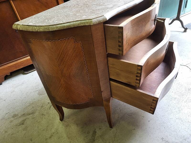 Curved chest of drawers in rosewood and marble marquetry