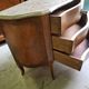Curved chest of drawers in rosewood and marble marquetry