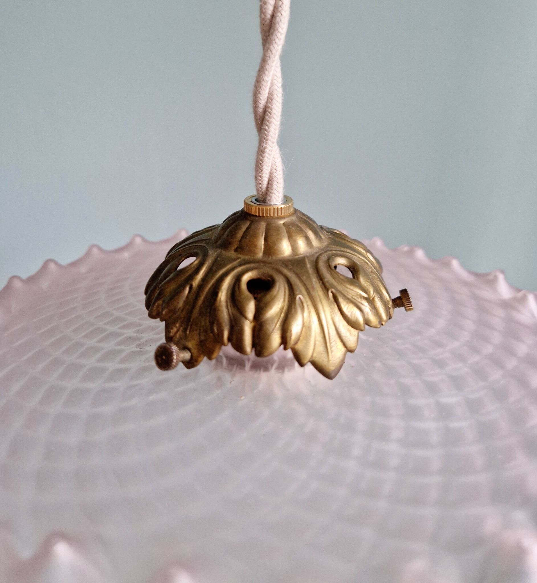 Pair of clear and pink satin glass scalloped pendant lights, 1920s-30s