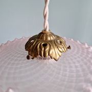Pair of clear and pink satin glass scalloped pendant lights, 1920s-30s