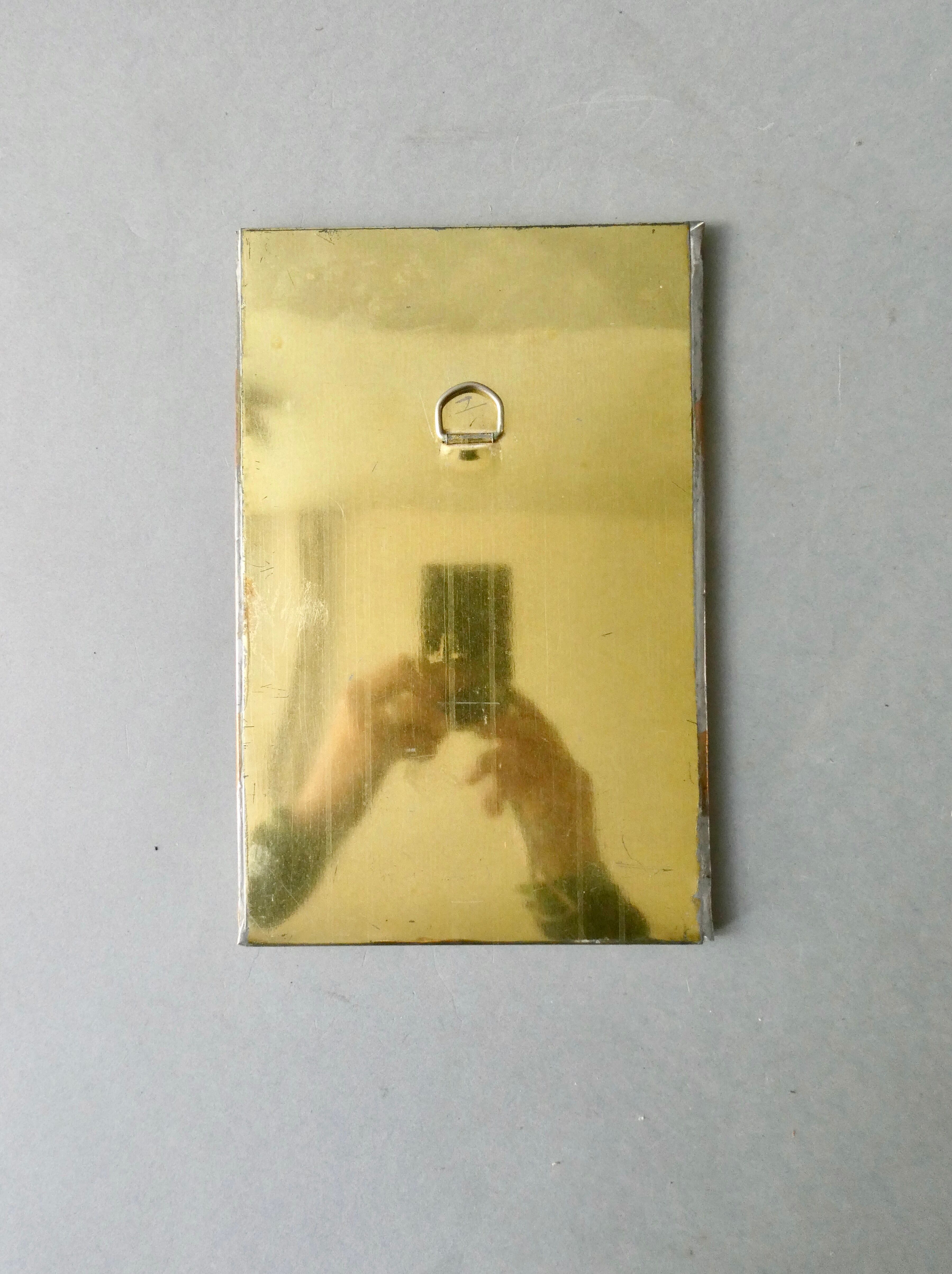 Moroccan mirror in chiseled brass, 70s