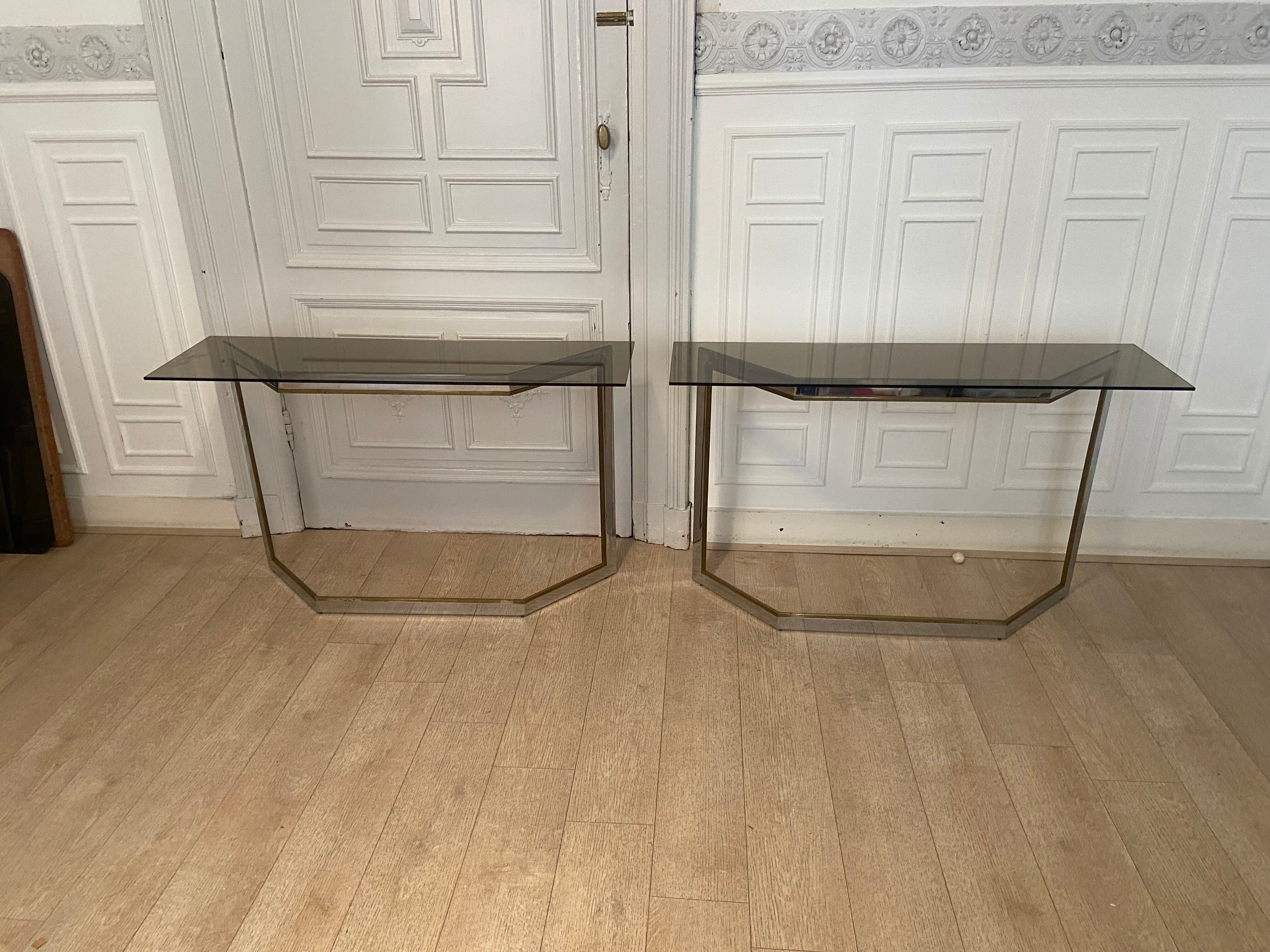 Pair of chrome metal consoles and smoked glass, Italy, 1970s