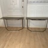 Pair of chrome metal consoles and smoked glass, Italy, 1970s