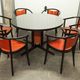 Table and 6 armchairs Baumann Diese, design Pagnon Pelhaître, Wenge color and red,