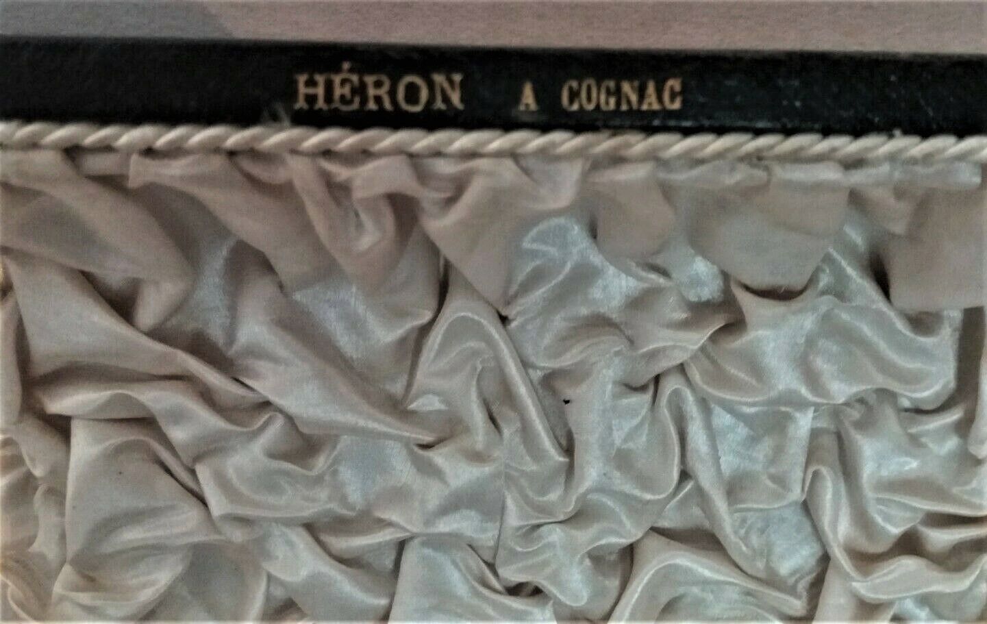 Twelve knife holders with ladle doors.